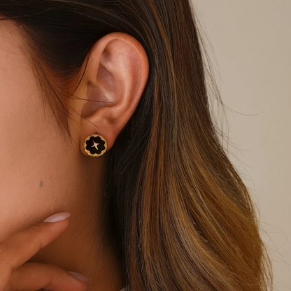 Close-up of model styling the celestial noir clips, showing the realistic "pierced" fit.
