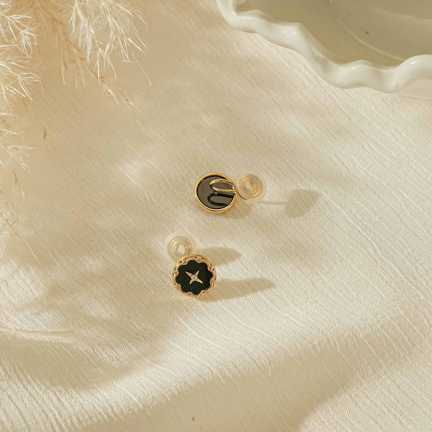Rear view showing the adjustable, pinch-free clip-on back for unpierced ears.