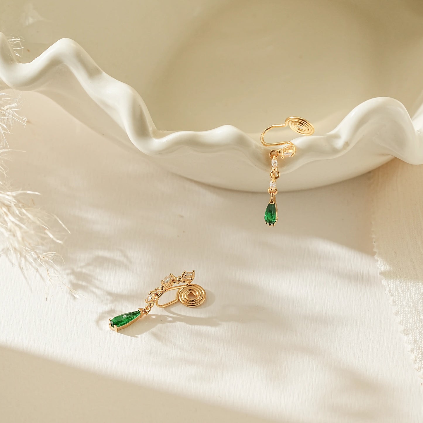 Side view showing the adjustable, pinch-free clip-on back for unpierced ears.
