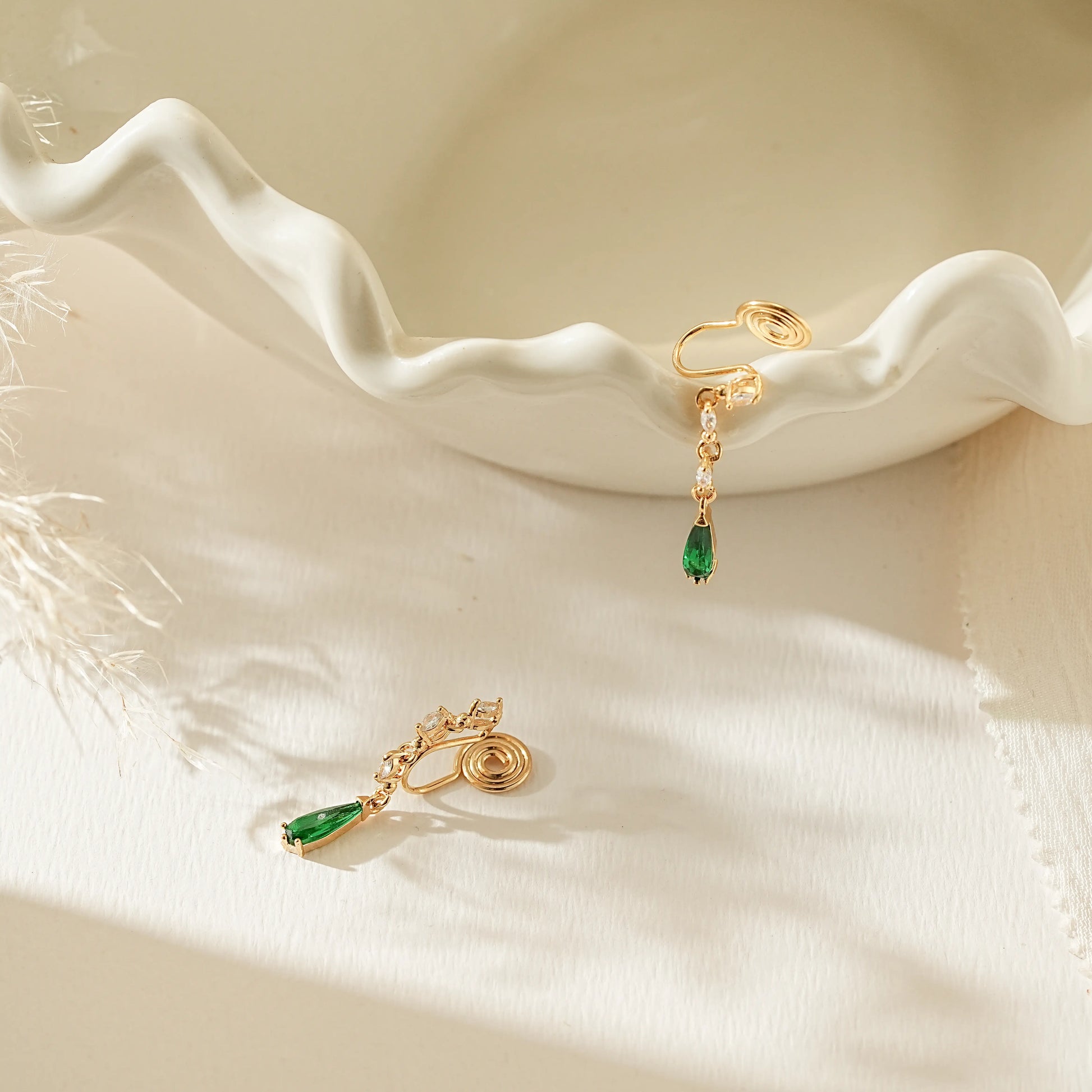 Side view showing the adjustable, pinch-free clip-on back for unpierced ears.