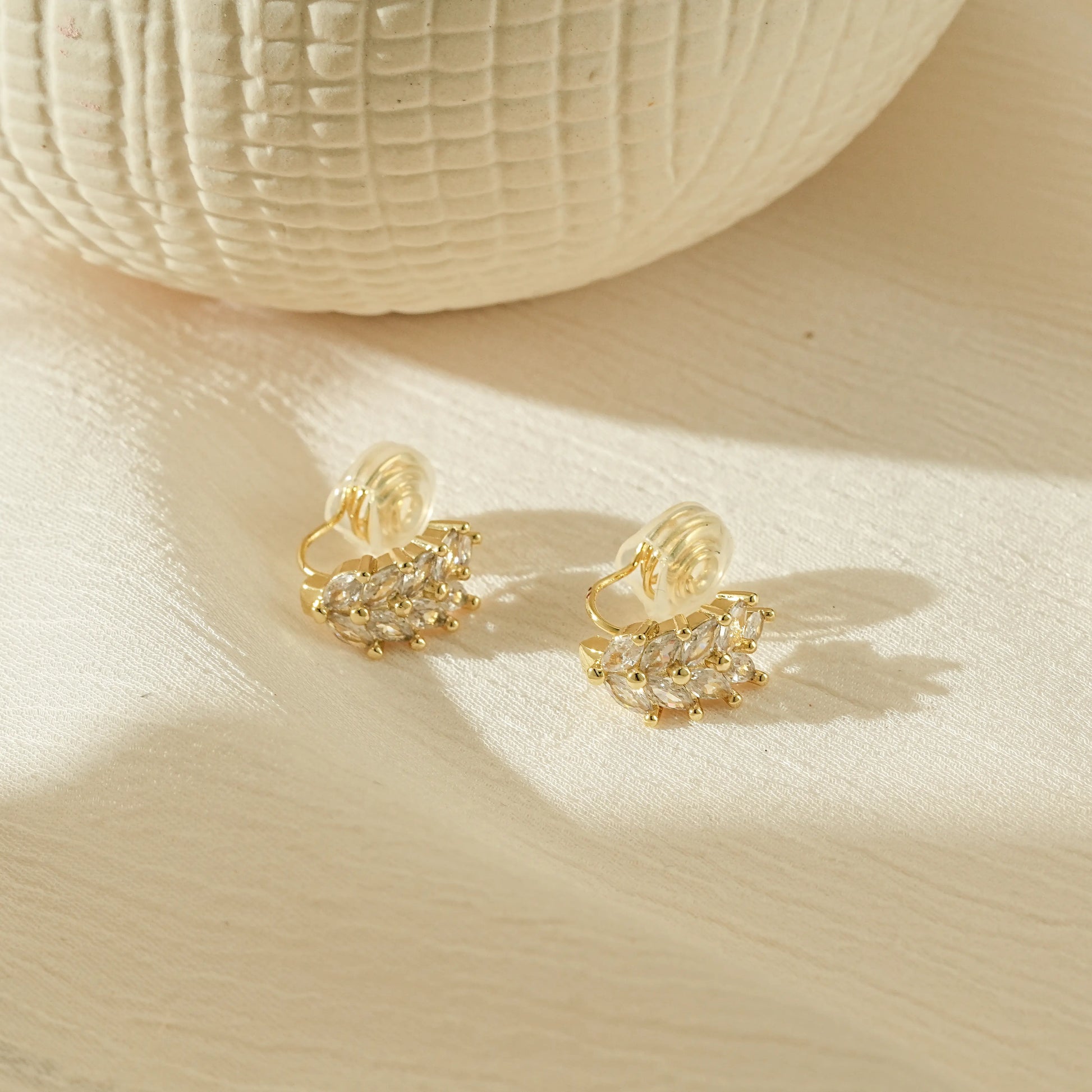 Side profile of wheat stalk clip-on earrings showing the adjustable mechanism for unpierced ears.
