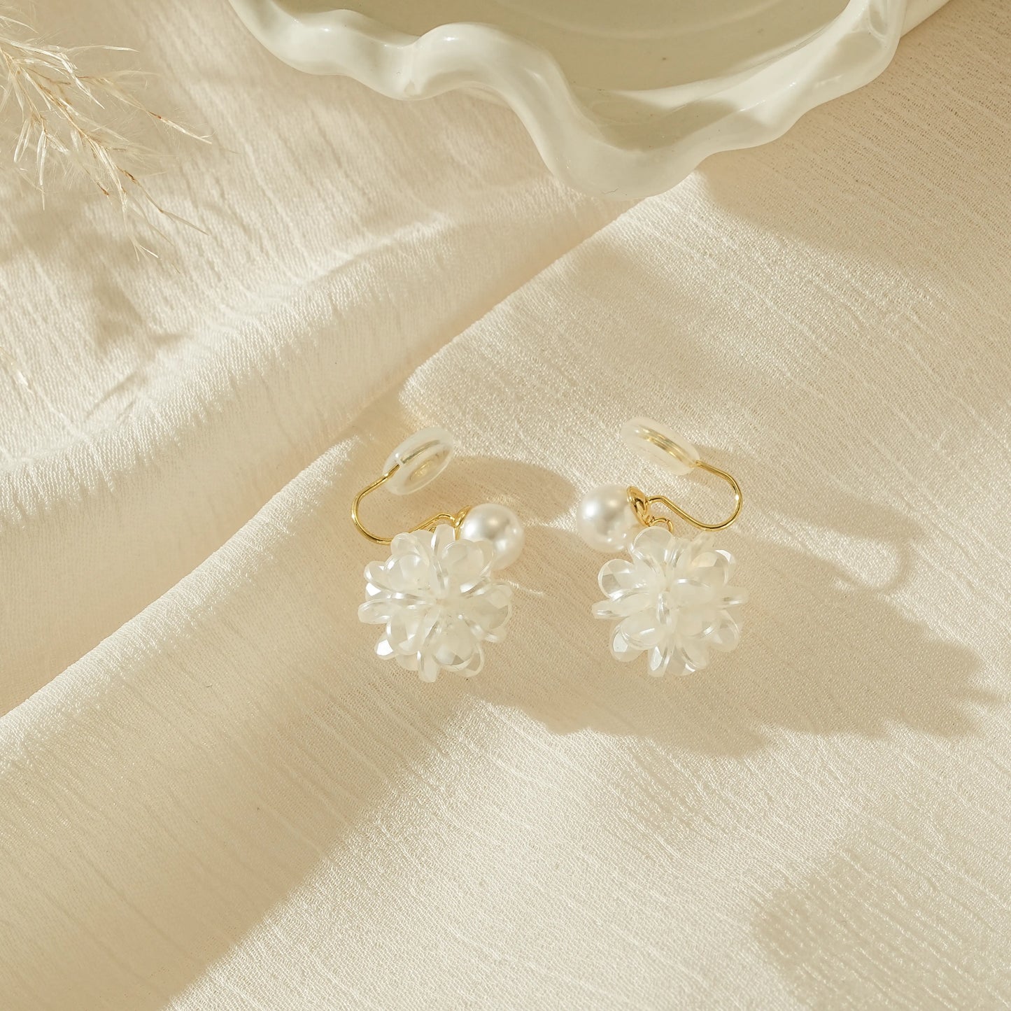 Side view showing the adjustable, secure clip-on back for unpierced ears.