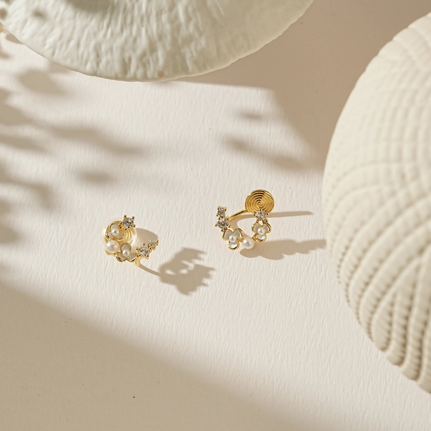 Side view showing the small, adjustable pinch-free clip-on back for studs.