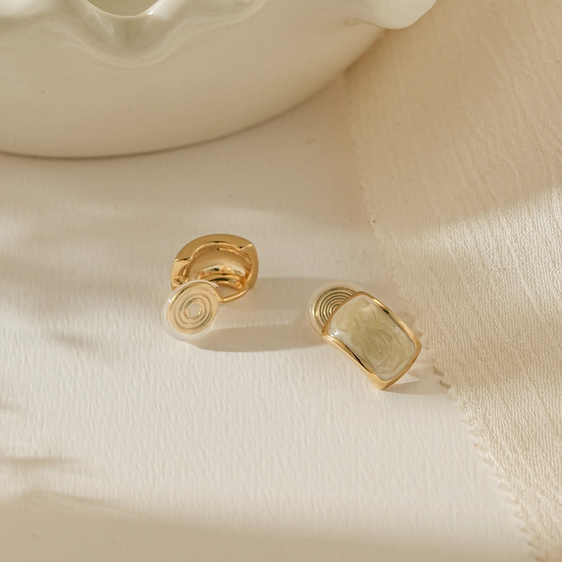 Side view showing the adjustable, pinch-free clip-on back for non-pierced ears.