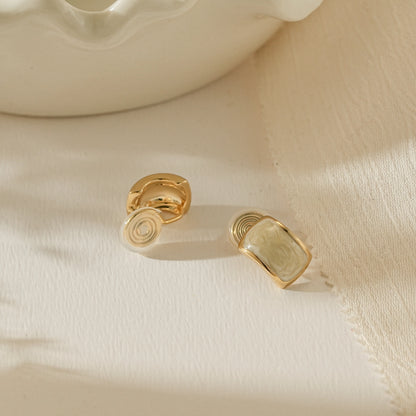 Side view showing the adjustable, pinch-free clip-on back for non-pierced ears.