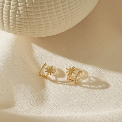 Double hoop star clip-on earrings in 18k gold plating, front view.